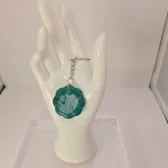 Green and white round keychain