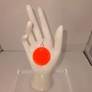 Orange round statement piece