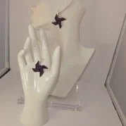 Star Knot purple polymer clay earrings